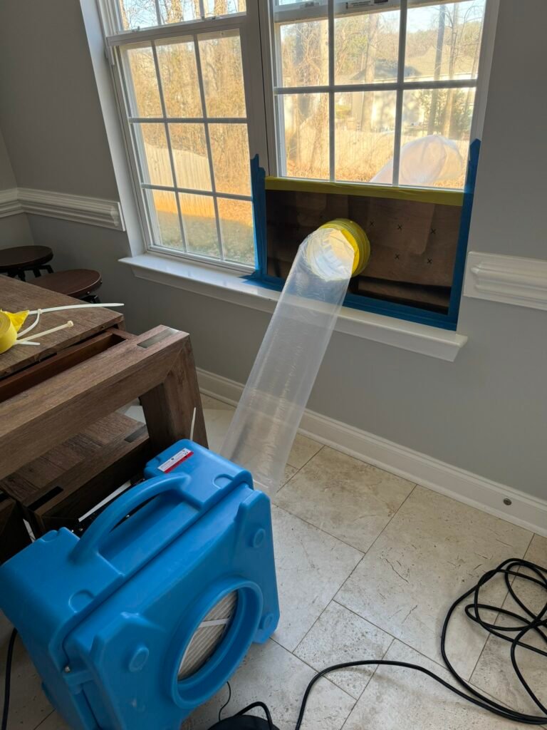 HEPA air scrubber running during mold remediation service