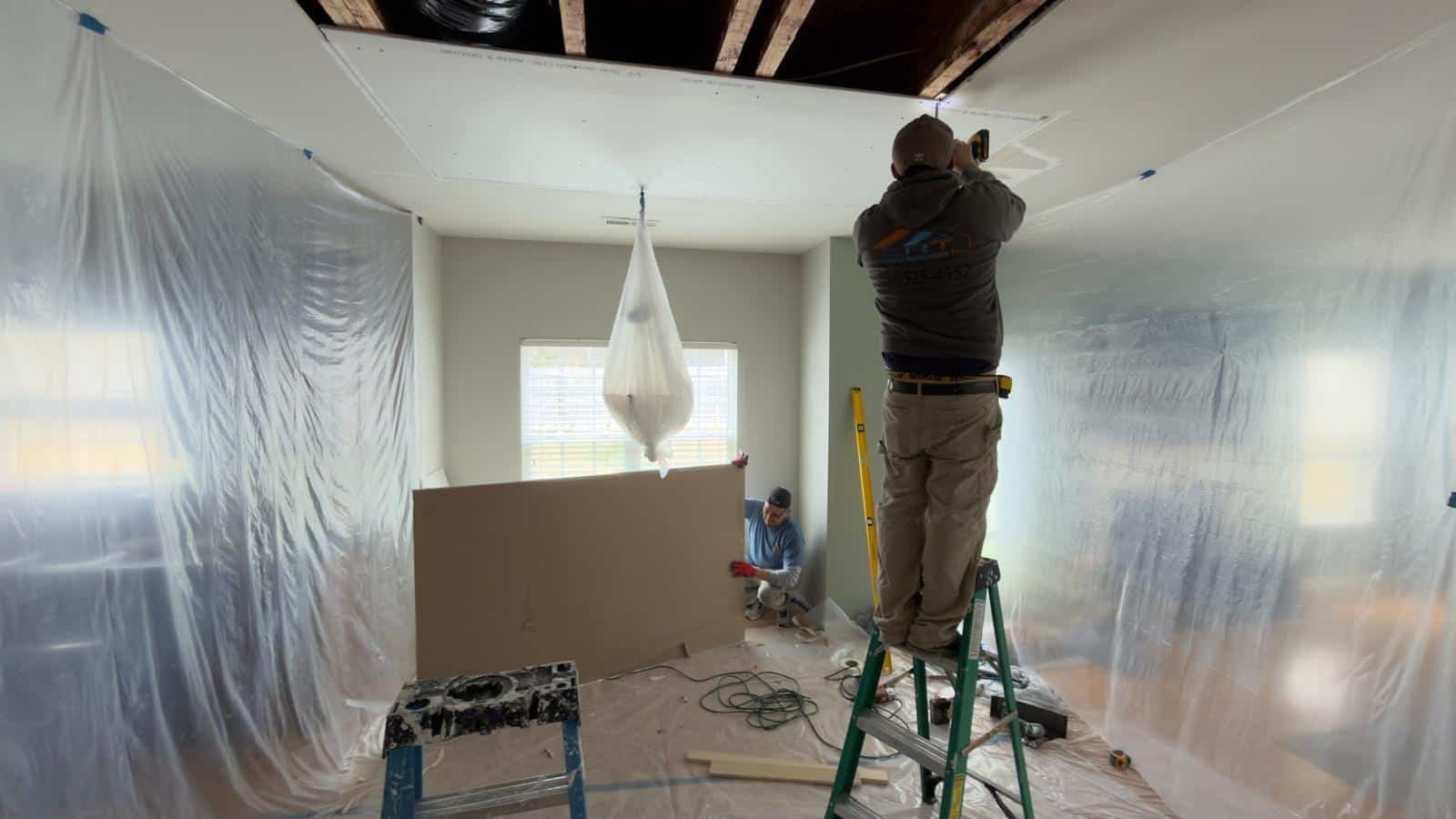ERT technicians performing structural repairs and drywall reconstruction in a Charlotte, NC home