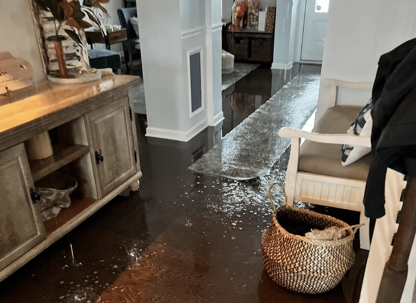 Water damage on a hardwood floor in a Charlotte, NC home