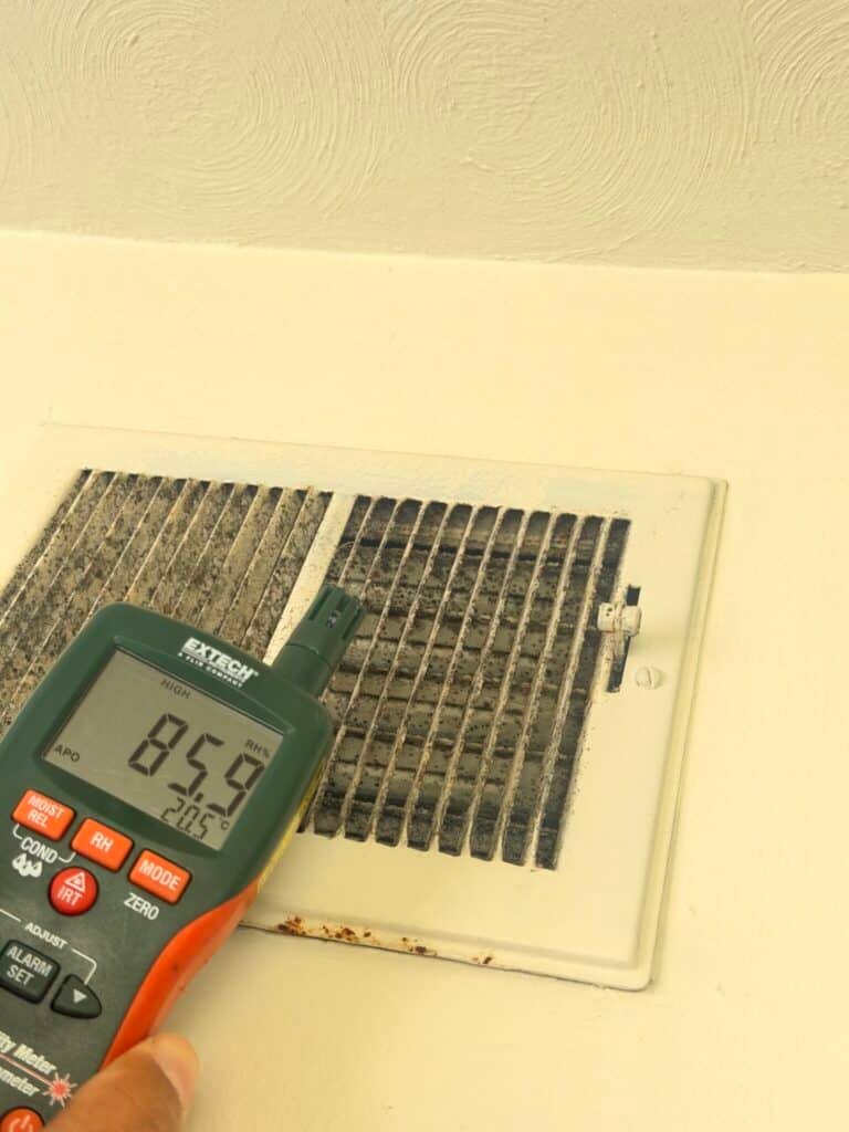 Black stains around HVAC vents in a Charlotte, NC home